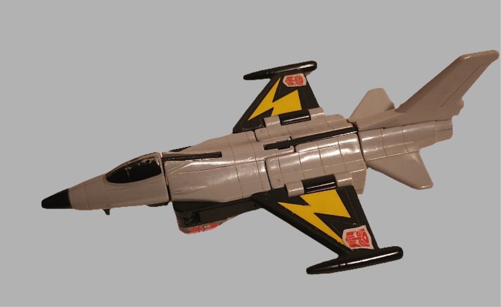 Skydive Aerialbots collectible toy jet with black and yellow accents on a gray background