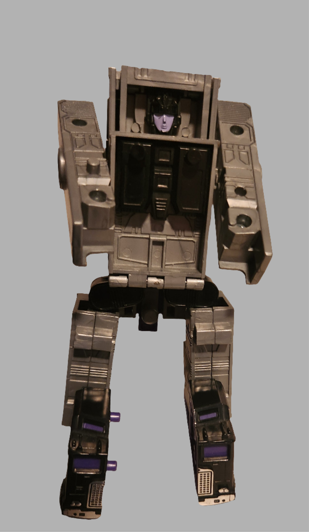 Motormaster Stunticons Transformers action figure with articulated limbs and gray details